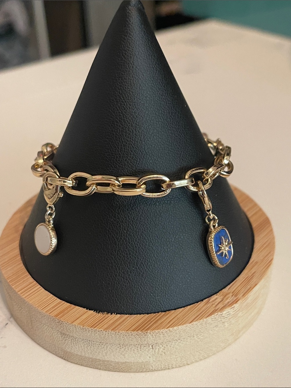 Gold Chain Charm Bracelet with Blue and White Enamel Accents